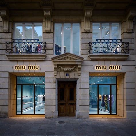 Shop Miu Miu .